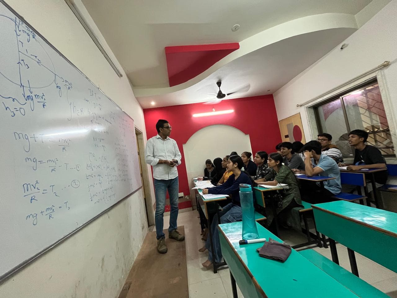 Students studying for JEE and NEET exams at Momentum Science Academy classroom
